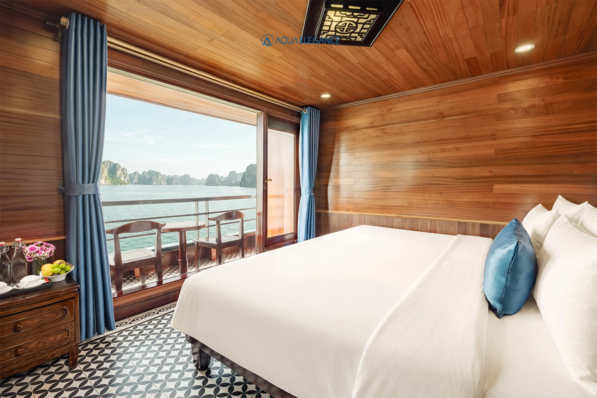 Junior Suite Balcony cabin with double bed and private balcony on Aqua Elegance Cruise