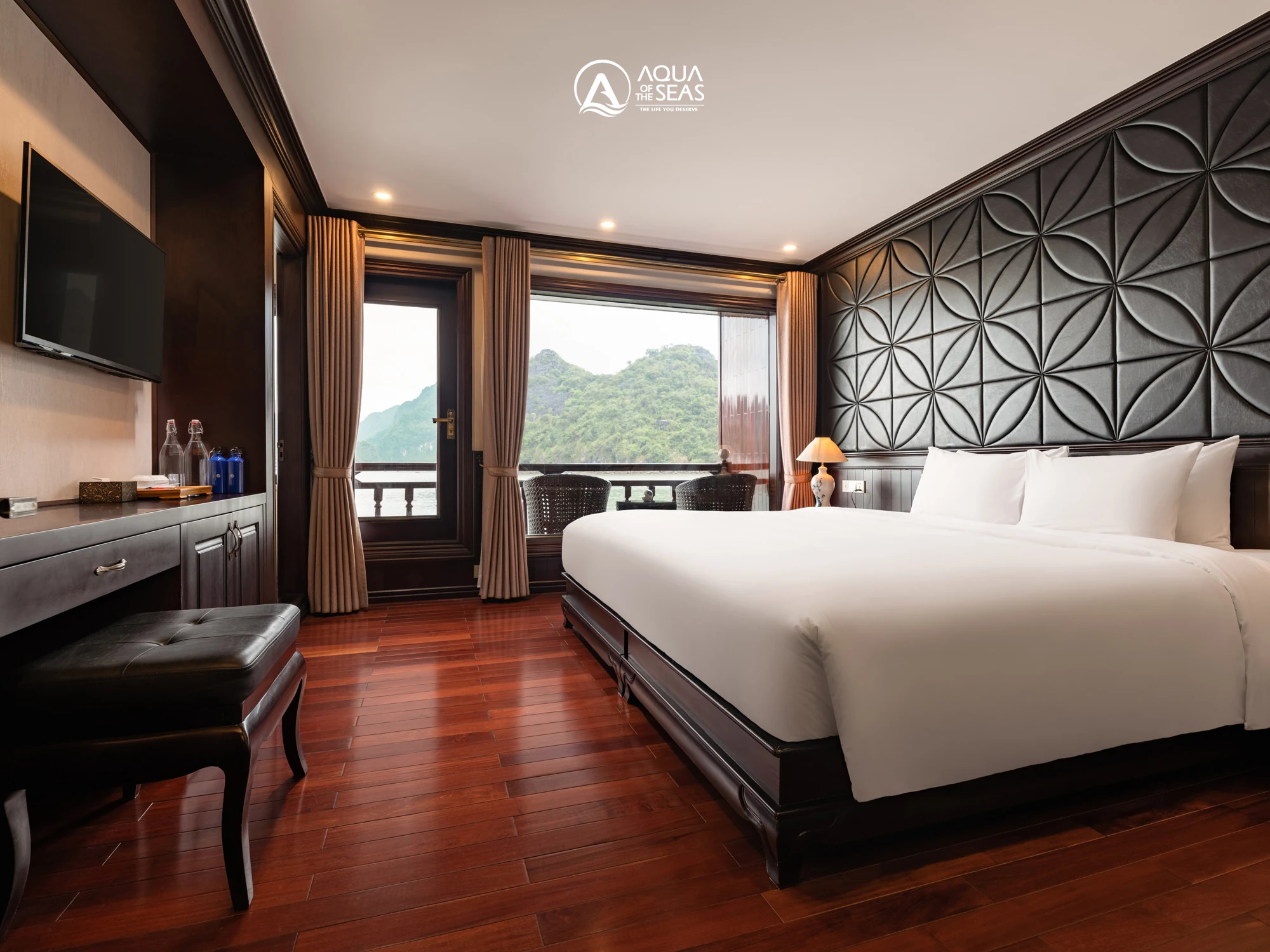 Junior Suite Balcony cabin with a double bed on Aqua Of The Seas Cruise