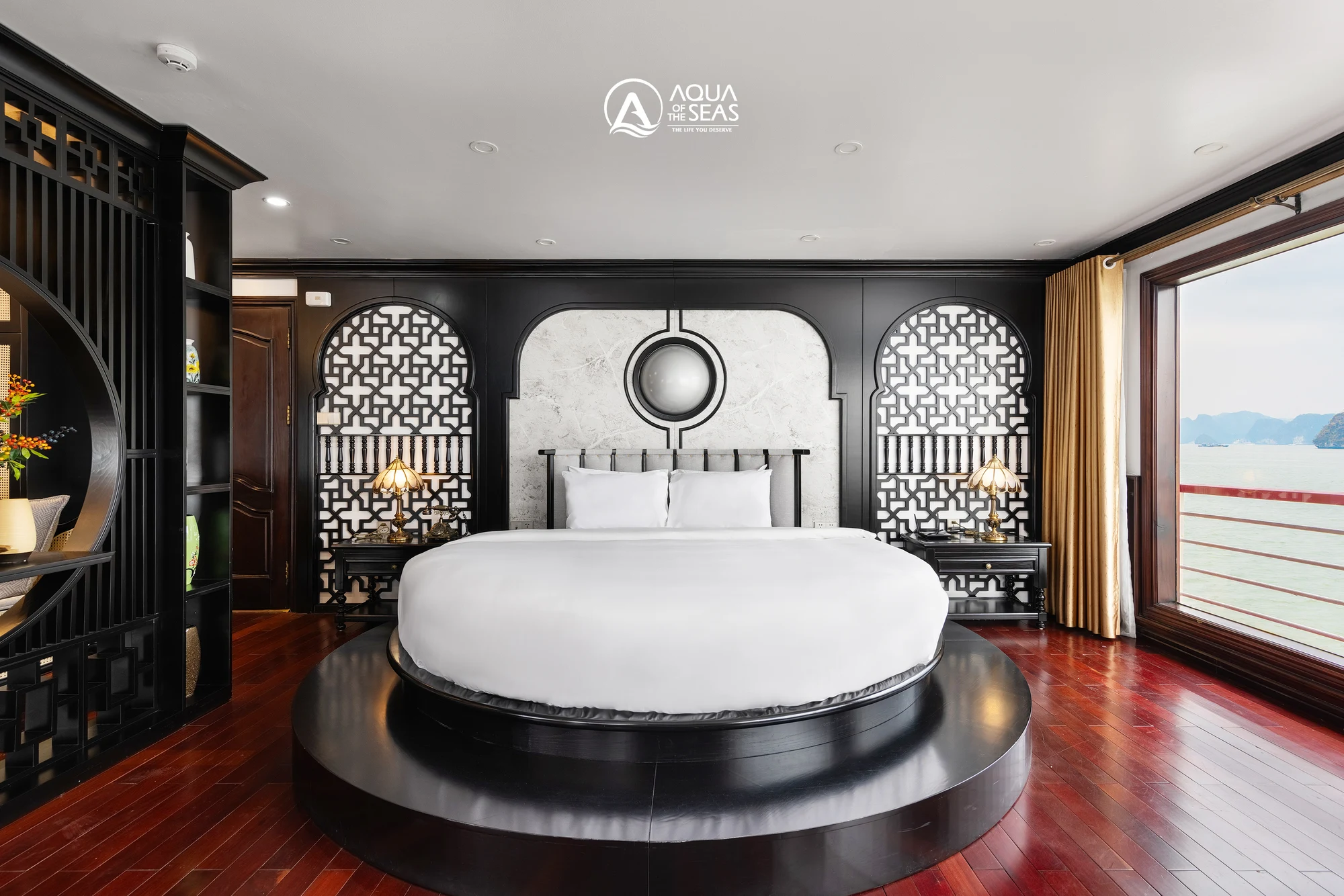 President Suite Panorama View with a round double bed on Aqua Of The Seas Cruise
